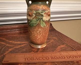 R202 - $50. Belived to be the  Original Roseville Pattern "Dahlrose Brown". Measures 3.5" x 6.25" tall. One minor chip on the base. 