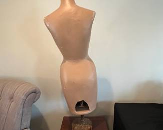 R107 - $75. Antique Paper Mache Female Torso Mannequin on Metal Stand. Measures 14" wide x 41.5" tall. 