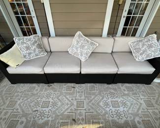 R165 - $225. Couch is in 4 pieces with Sunbrella Cushions. Used on covered screened in porch. 2 ends are 32.75" wide x 32.75" deep x 29" floor to top of back. Center seats are 27.25" wide. 