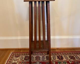 R254 - $65. Antique Mission Style Plant Stand. Measures 11" square x 31" tall. Sturdy - a little warping on the top from use. 