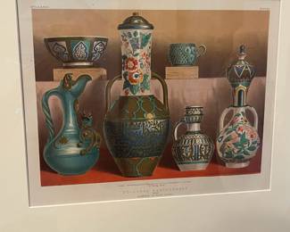 P25 - $50 Pair of Framed Prints. Top is titled "Enamelled Ware from India" Bottom is "Coloured Earthenware From Algeria  & Turkey" Framed each Measures 22" x 18". 