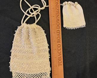 R142 - $30. Antique Off White Purse with clear beads attached. Appears to be fine crochet purse with small change bag attached. Excellent Condition. 