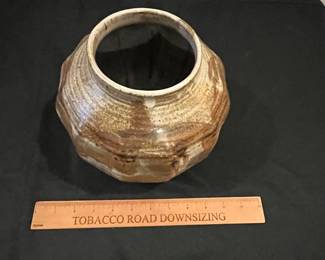 P67 - $20. Pottery Vase signed "Davis". Measures 9" wide x 8" tall. 