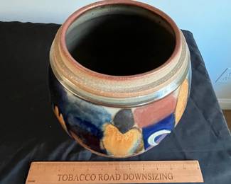 P95 - $15. Signed Pottery Vase. Measures 7" at the widest point x 10" tall. 