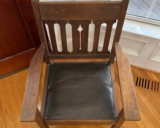 P11 - $75. Mission Style Single Arm Chair with Leather Seat. Measures 25" wide x 23" deep x 36" tall. 