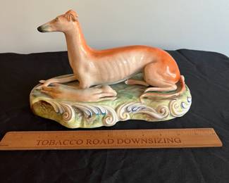 P92 - $95. Staffordshire Greyhound with hare. Does have crazing, chips on the bottom