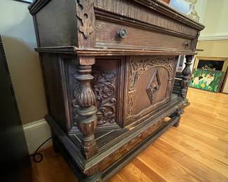 R154 - $125. Small Buffet / Liquor Cabinet by JB Van Sciver Co. Camden NJ. Solid Wood. Measures 40.5" x 19.5" x 36" tall. A cleaner spilled down the front and discolored a few places. Perfectly functional as it is or a great project piece! Drawer slides easily and door opens for storage. 