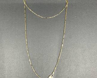 A8 - $500. 14kt Gold Chain. Looks like a box chain and every few has a larger space. Measures 24" long. 