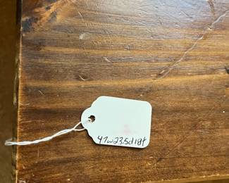 P98 - $40. Wooden Top Coffee table with Iron Base. Measures 47" wide x 23.5" x 18" tall. Would benefit from some reinforcements under the wood. 