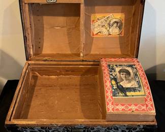 R110 - $50. Small Trunk in Very good condition. Missing leather handles. Measures 16" wide x 9.5" deep x 12" tall. 