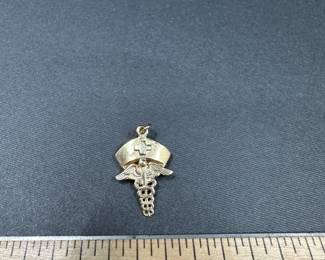 A14 - $150. Nurse Charm 14kt. 