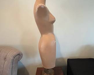 R107 - $75. Antique Paper Mache Female Torso Mannequin on Metal Stand. Measures 14" wide x 41.5" tall. 