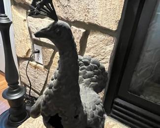 P61 - $40. Heavy Metal Peacock that used to be part of a fireplace screen (feathers missing) Has hole in the chest. Measures 20" tall. 