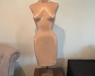 R107 - $75. Antique Paper Mache Female Torso Mannequin on Metal Stand. Measures 14" wide x 41.5" tall. 