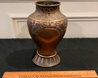 P52 - $20. Copper Vase. Measures 6" wide x 9" tall. (Base is a little bent but it won't tip over!)