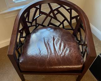 P100 - $150. Crate & Barrel Ankara Chair. Leather cushion & Caning are in ver good condition! One back leg has scrape marks (you don't see if they're in the corner!) Measures 29.5" wide x 27" deep x 30" tall. Floor to seat is 17". 