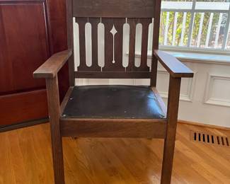 P11 - $75. Mission Style Single Arm Chair with Leather Seat. Measures 25" wide x 23" deep x 36" tall. 