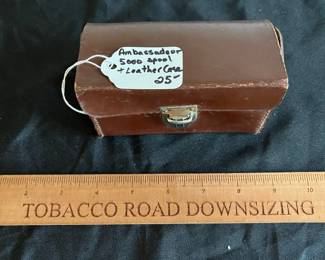 R175 - $25. Spare spool for Ambassadeur 5000 with parts in leather case. 