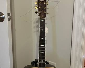 R243 - $100 Yamaha Guitar. Acoustic Guitar with Stand. Model FG-375S. 