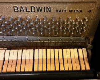 R153 - $750. Baldwin Acrosonic Spinet Piano. Serial # 896997 (late 1960s). Measures 57.5" x 25.5" x 35.75" tall. Includes stool. One black key doesn't make a sound and it will need to be tuned after moving - all other keys work and none are "sticky". Has minor crazing on the finish and a few minor marks here and there but not major issues. 