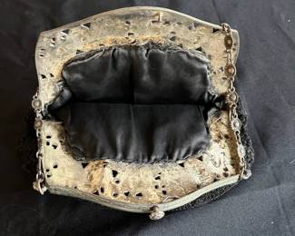 R178 - $50. Silver Plated Cherub Victorian Purse Frame and Handle. I don't think the bag & lining are original but they are in very good condition! Latch on the purse does work. 