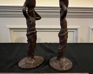 P58 - $45. PAIR of Cast Iron Figural Candlesticks. Measures 10" tall. 