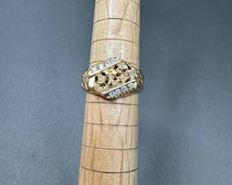 A7 - $300. 10kt Gold - Size 8. Gold band with 8 small accent diamonds. 