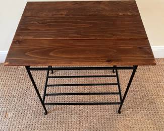 P76 - $30. Small Side Table with Iron Base & Wooden Top. Measures 24" x 18" x 23.5" tall. 