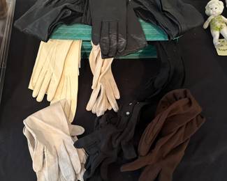 R130 - $35. 9 Pairs of Vintage Kid Gloves in Box. 