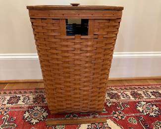 R240 - $85. Vintage Longaberger Laundry Basket. Measures 17.25" square x 22.5" tall. Has plastic liner which is in excellent condition!