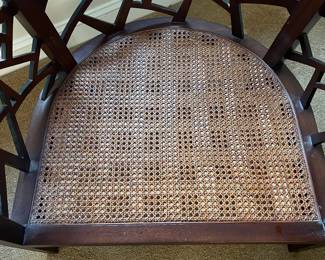 P100 - $150. Crate & Barrel Ankara Chair. Leather cushion & Caning are in ver good condition! One back leg has scrape marks (you don't see if they're in the corner!) Measures 29.5" wide x 27" deep x 30" tall. Floor to seat is 17". 