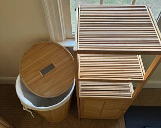 R114 - $45. 2 Piece Bamboo Bathroom Set. Hamper & Shelf. Looks very pretty but it is a dainty set. Hamper is 23" tall. Shelf is 16" wide x 13" deep x  42" tall. 