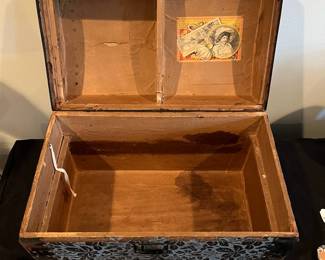 R110 - $50. Small Trunk in Very good condition. Missing leather handles. Measures 16" wide x 9.5" deep x 12" tall. 