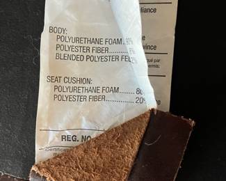 P100 - $150. Crate & Barrel Ankara Chair. Leather cushion & Caning are in ver good condition! One back leg has scrape marks (you don't see if they're in the corner!) Measures 29.5" wide x 27" deep x 30" tall. Floor to seat is 17". 