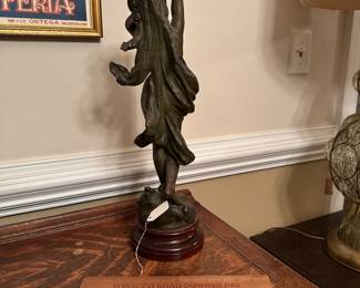 P64 - $125. Antique La Vague Par Moreau Lady Statue with Wooden Base painted with marbled look. Plaque on the bottom reads - "La Vague Par Hip. Moreau". Measures 20" tall. (I believe it is Spelter with bronze paint)