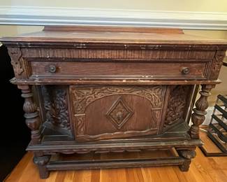 R154 - $125. Small Buffet / Liquor Cabinet by JB Van Sciver Co. Camden NJ. Solid Wood. Measures 40.5" x 19.5" x 36" tall. A cleaner spilled down the front and discolored a few places. Perfectly functional as it is or a great project piece! Drawer slides easily and door opens for storage. 