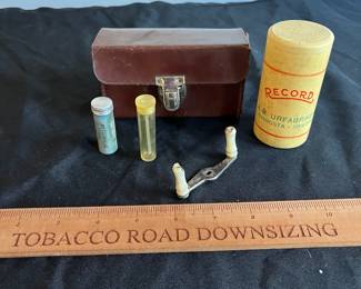 R175 - $25. Spare spool for Ambassadeur 5000 with parts in leather case. 