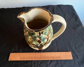 P94 - $15. Janet Resnik Pottery Pitcher. Measures 7.5" tall. No issues noted. 