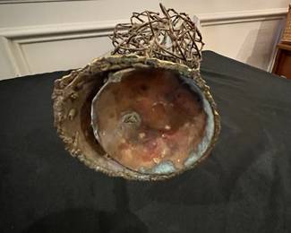 P63 - $75. Brutallist Sculpture. Unsigned. Measures 9" at the widest point x 24" tall. 