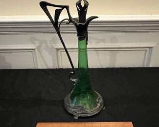 P49 - $125. Art Nouveau Carafe. Green Glass & Pewter. Measures 15" tall. 