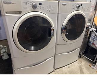 washer and dryer with base