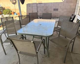 outdoor table with 8 chairs