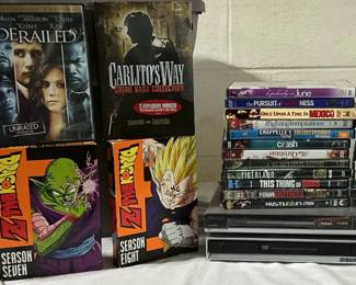 DVD Players And Bin Full Of Mystery DVDs