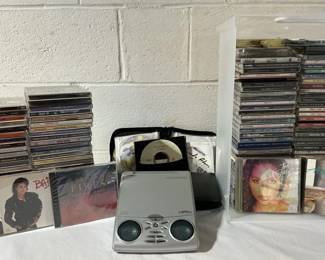 Sharper Image Cd Player With Mystery Cds