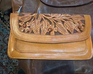Leather tooled clutch $50.00