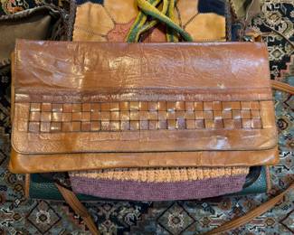 Leather woven pattern clutch $50.00