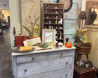 vintage dresser and books, framed art, sewing box
