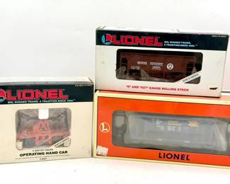 (3) Lionel Toy Trains
Lionel Pennsylvania Ore Car model train car
Lionel Ontario Northland hopper car
Lionel 6-18401 O Gauge Operating Hand Car