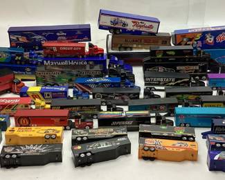 ASSORTED TRANSPORTER HAULER TRUCKS, NASCAR, KELLOGG’S, DUPONT, VALVOLINE, STP, REMINGTON, MAXWELL HOUSE, INTERSTATE BATTERIES, KODAK, ALLIANCE