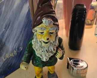 Vintage cast iron garden gnome, or  keebler elf 
$45 . Weighs about 10 lb or so